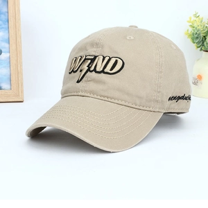 Khaki cotton baseball cap with WIND embroidery shown in a balanced aesthetic layout