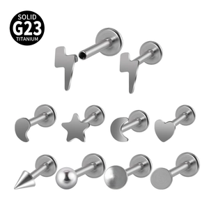 Solid G23 titanium labret studs set with moon, star, and heart shapes in steel color