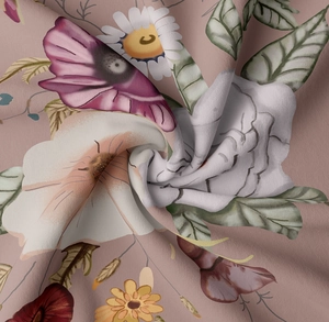 Detailed close-up of floral tapestry fabric with soft pink base and woven twill texture