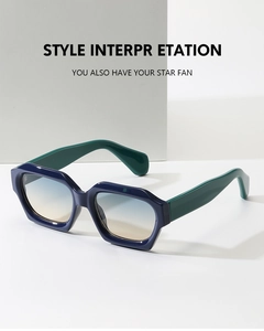 Close-up of stylish rectangle sunglasses with blue frames and green temples