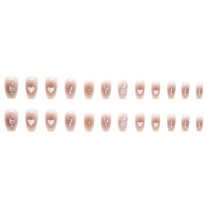 Nude pink press-on nails set with heart patterns, pearls, and crystals, 24-piece kit