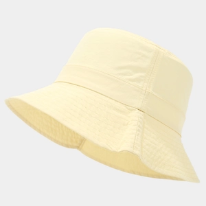 Detail view of water-resistant light yellow bucket hat with reinforced stitching