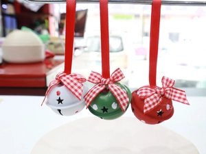 Three 4cm metal Christmas star bells with red checkered bows and hanging ribbons
