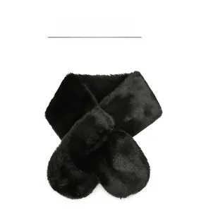 Close-up of premium black faux fur winter scarf with dense texture and silky finish