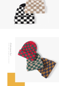 Detailed view of checkered knit beanies in five stylish color combinations