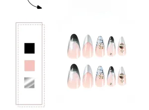 Detail of almond-shaped press-on nails with silver stars, rhinestones, and black gradient