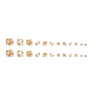 Short brown chestnut press-on toenails set with white flower patterns on white background