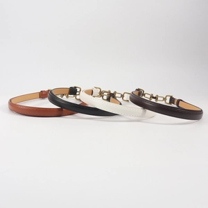 Set of four adjustable leather belts in black, brown, white and coffee with gold buckles