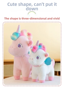 Close-up of plush unicorn toys with rainbow manes and pearl-decorated bow ties