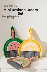 Detail of mini fruit-shaped desktop cleaning sets with watermelon and lemon designs