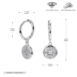 Detailed view of S925 sterling silver hoop earrings with zircon star compass pendants