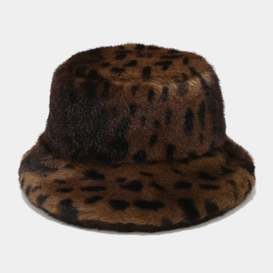 Close-up of leopard print faux fur bucket hat showing soft plush texture and pattern