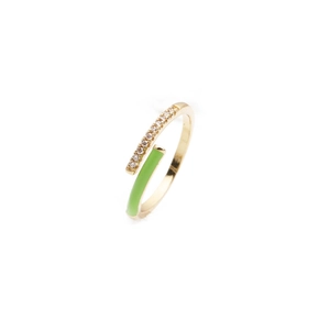Adjustable gold ring featuring green enamel and pavé-set zircons on white background