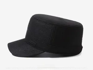 Close-up of black men's winter flat top cap with fleece lining and SPORT embroidery detail