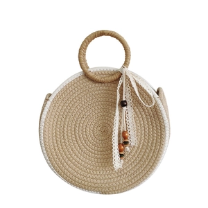 Minimalist round straw tote bag with white trim and lace ribbon with wooden beads