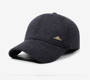 Detail of grey wool blend winter cap with metal Sport Spirit logo on side