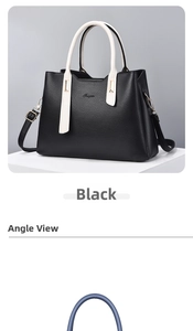 Detail view of contrast color black leather tote bag with white handles and brand logo