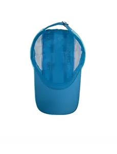 Detail view of the breathable blue baseball cap interior with moisture-wicking fabric