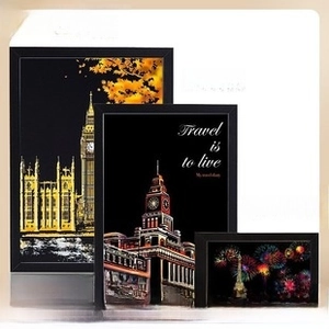 Detail of A4 and postcard size black picture frames with world landmark scratch art