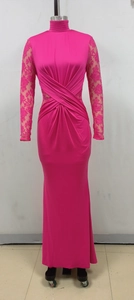 Detail of rose red maxi dress featuring lace sleeves and elegant ruched waist design