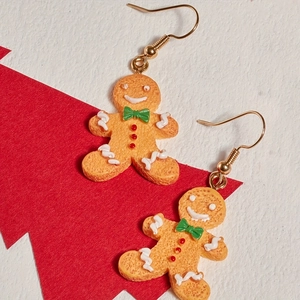 Festive gingerbread man earrings in resin with gold hooks for Christmas celebration