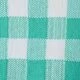 Close-up of mint green and white checkered knit fabric with soft texture detail