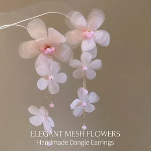 Elegant chiffon flower fringe earrings with pink organza petals and gold tassel chains