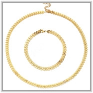 Detail of summer style golden stainless steel flower chain necklace and bracelet set
