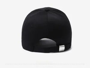 Detail of adjustable black cotton baseball cap back view with silver metal buckle