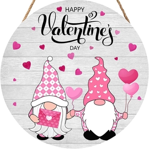Detail of wooden Valentine's Day sign with Happy Valentine's Day text and gnome motifs