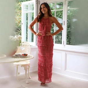 Elegant dark pink sleeveless chiffon maxi dress with ruffled layers and halter neckline