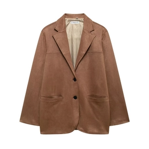 Detailed view of a brown faux suede blazer with two black buttons and front patch pockets