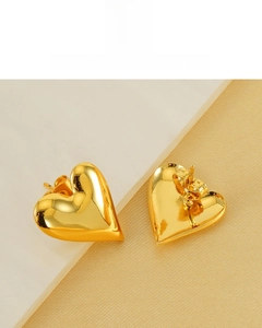 Detail of 18K gold plated heart stud earrings showing back pins and butterfly clasps