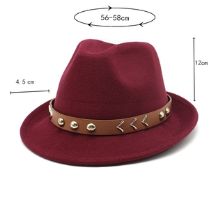 Detail showing burgundy wool felt jazz hat with gold buckle and size markings