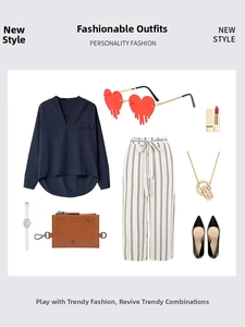 Flat lay of red heart teardrop sunglasses with fashion apparel and chic accessories