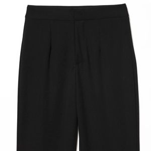 Elegant high-waisted wide-leg black trousers with metal button and smooth texture