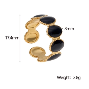 Détail bague dorée ouverte avec inserts noirs montrant le diamètre 17,4mm et poids 2,8g