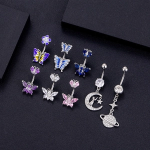 8-piece zircon navel ring set featuring butterfly, crescent moon, and planet designs