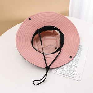 Pink wide brim sun hat with mesh lining and adjustable chin strap detail view