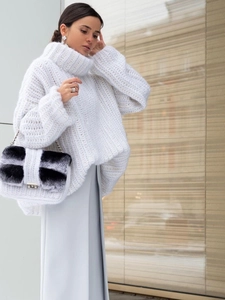 Chunky knit white turtleneck oversized sweater featuring soft long sleeves for women