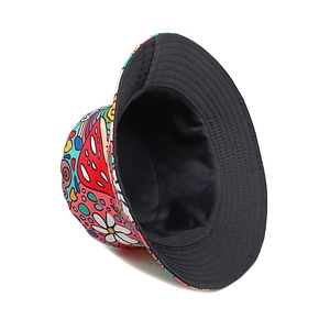 Colorful mushroom print bucket hat with reversible black inner lining for outdoor sun protection