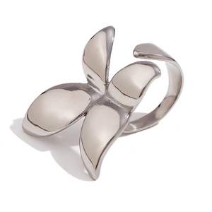 Polished silver stainless steel open ring with abstract butterfly petal design on white background
