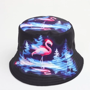 Detail of neon flamingo and forest print on black reversible bucket hat for outdoor wear