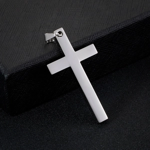 Minimalist silver titanium steel cross pendant necklace with a polished metallic finish