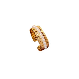 Gold plated hollow open ring with small pearls in a vintage minimalist French style