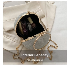 Macro view of sparkly sphere clutch interior showing space for lipstick and makeup items