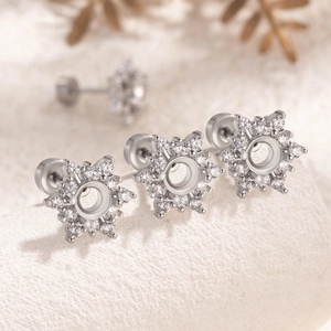 Set of 4mm silver snowflake cartilage studs with sparkling crystals and screw back