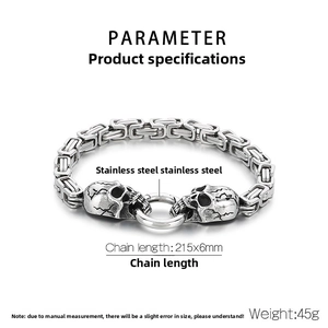 Macro detail of retro punk skull bracelet in stainless steel with double box chain links