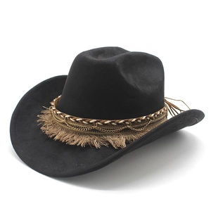Detail of black fedora hat with woven bands, gold chains, and ethnic fringe tassels
