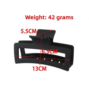 Detail showing 13cm matte black square hair claw clip with size and 42g weight specs
